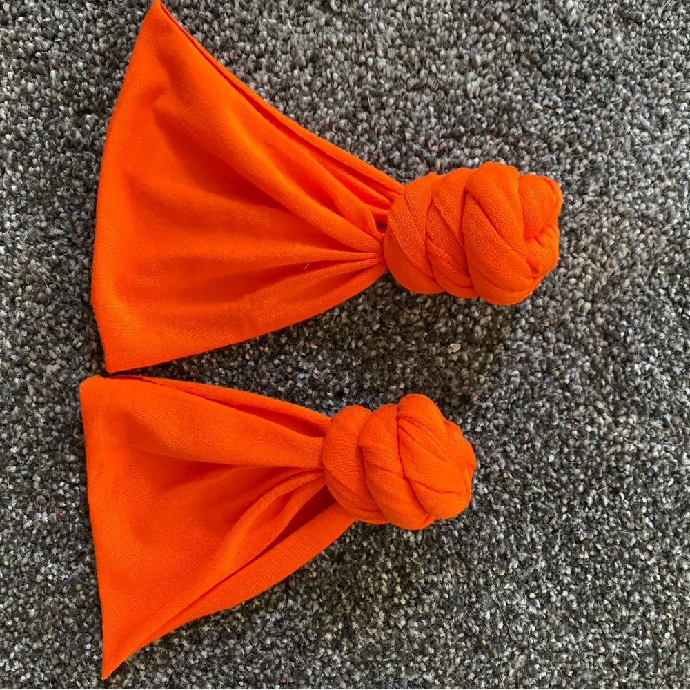 Bright orange Topknot bun